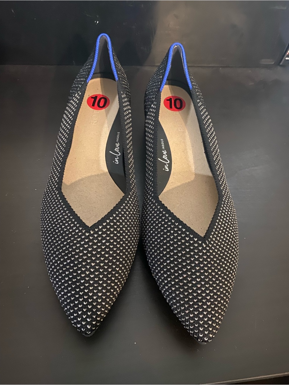 Rothy's Black Pointed Knit Flats with Blue Heel Trim
